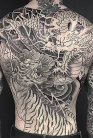 Men's full back dragon and tiger battle tattoo pattern