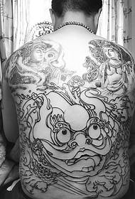 Very unique black and white totem tattoo picture