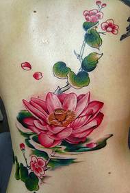 Girl full of back lotus flower and flower branch tattoo