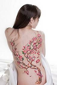 Plum blossom tattoo on the back of a beautiful woman