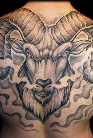Man carrying angry goat tattoo on his back