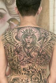 Male back in the 80's was filled with totem tattoos