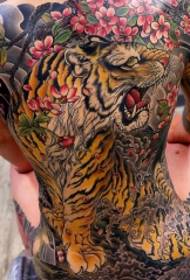 Tiger's flower painted tattoo pattern with domineering roar