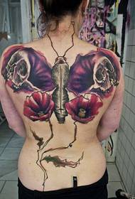 Polni hrbtni metuljčki lok in cvetni vzorec tatoo