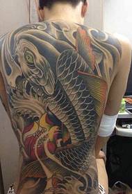 The large squid tattoo pattern covering the back is full of vitality
