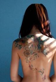 Girl's beautiful full back floral tattoo