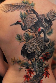 Female back with a crane tattoo pattern