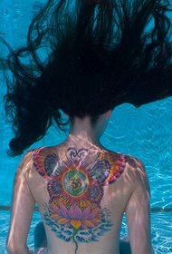 Female full back lotus butterfly totem tattoo