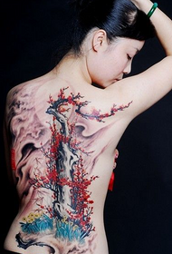 Pretty plum landscape tattoo on girl back