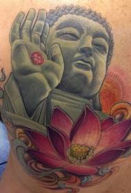 Beautiful colorful Buddha statue and lotus tattoo pattern on the back