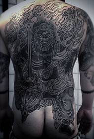 Full of unrecognizable Ming Wang tattoo pattern