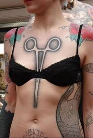 Girls big chest scissors tattoo pattern