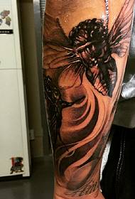 man's favorite arm totem tattoo