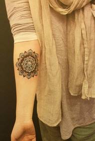 female arm vanilla tattoo pattern