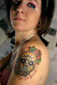 woman's shoulder spider web hoe Tattoo