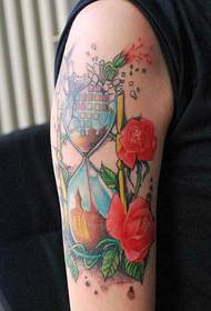 arm trasig timglas ros tatuering