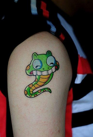 girl arm is a cartoon cobra tattoo