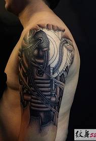man should Come to a mechanical tattoo