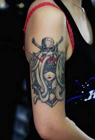 girl arm Medusa tattoo pattern