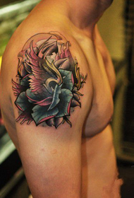 male arm rose wing tattoo
