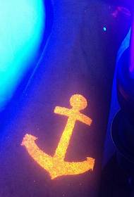 arm orange anchor fluorescent tattoo