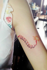 tatuaj mic braț cu scânteie