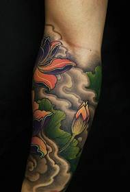 a Gorgeous arm color lotus tattoo