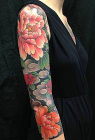 mature female arm very good looking Dudan flower tattoo
