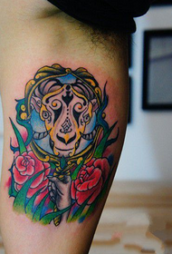 inner arm sheep head rose tattoo