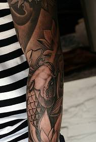Modernist Arm black and white flowers and squid tattoo