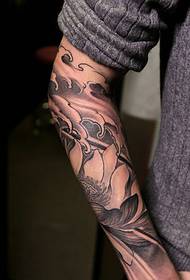 Young man should have handsome arm totem tattoo