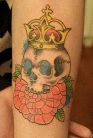 arm good-looking skull crown tattoo pattern