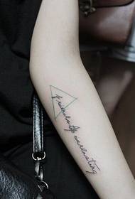 inner arm triangle English tattoo