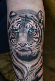 Tiger tattoo on the arm of the mighty domineering