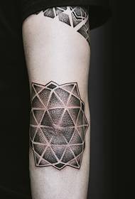 a simple arm tattoo in a stylish atmosphere