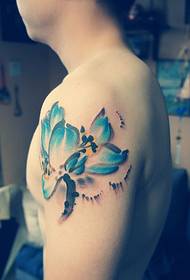 inkt lotus lotusarm tatoet