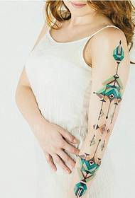 sexy girl with very bright totem tattoo