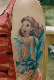 beautiful colored mermaid tattoo on the big arm