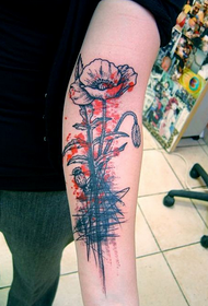 good-looking abstract flower tattoo on the arm