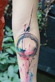 There is a re-circular watercolor on the arm
