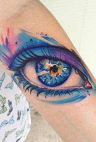 very individual eye tattoo on the arm