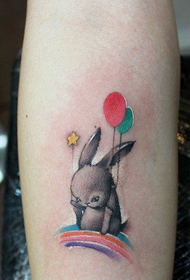 woman's little arm very cute bunny tattoo picture