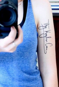 English word design tattoo on female arm