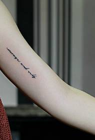 the inner side of the falling Simple English Tattoo