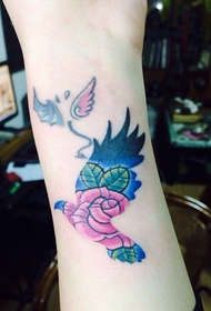 small arm bird rose tattoo pattern