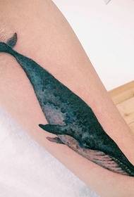 arm a very realistic 3d small shark tattoo