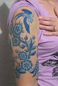 Arms a blue and white tattoo pattern