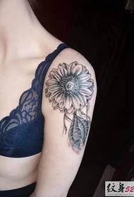 girl arm black gray sunflower tattoo