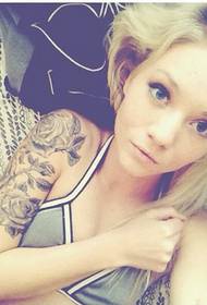 Beautiful flower girl arm tattoo