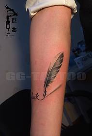 Arm fashion feather tattoo